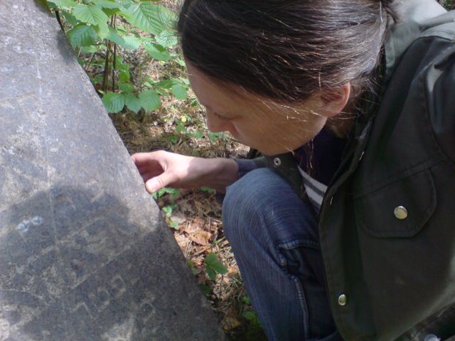 Kasia Bielawska studying the
                                    Gravestone