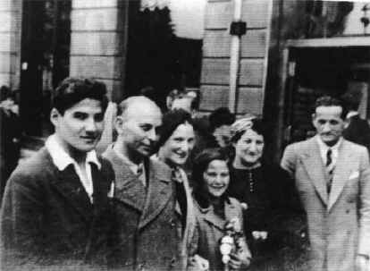 Photograph of Joseph and Etta Reich and others.