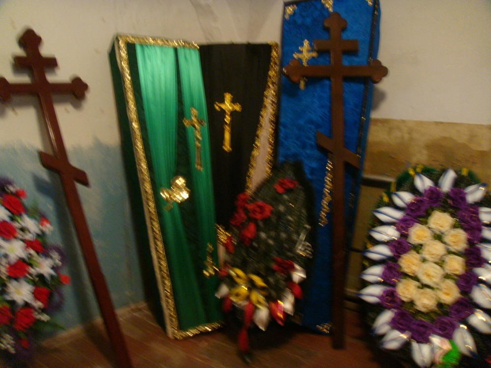 Crosses and
              Coffins for Sale in the Rabbi's House