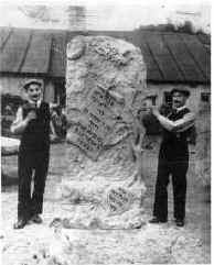 [photo of two brothers and tombstone]