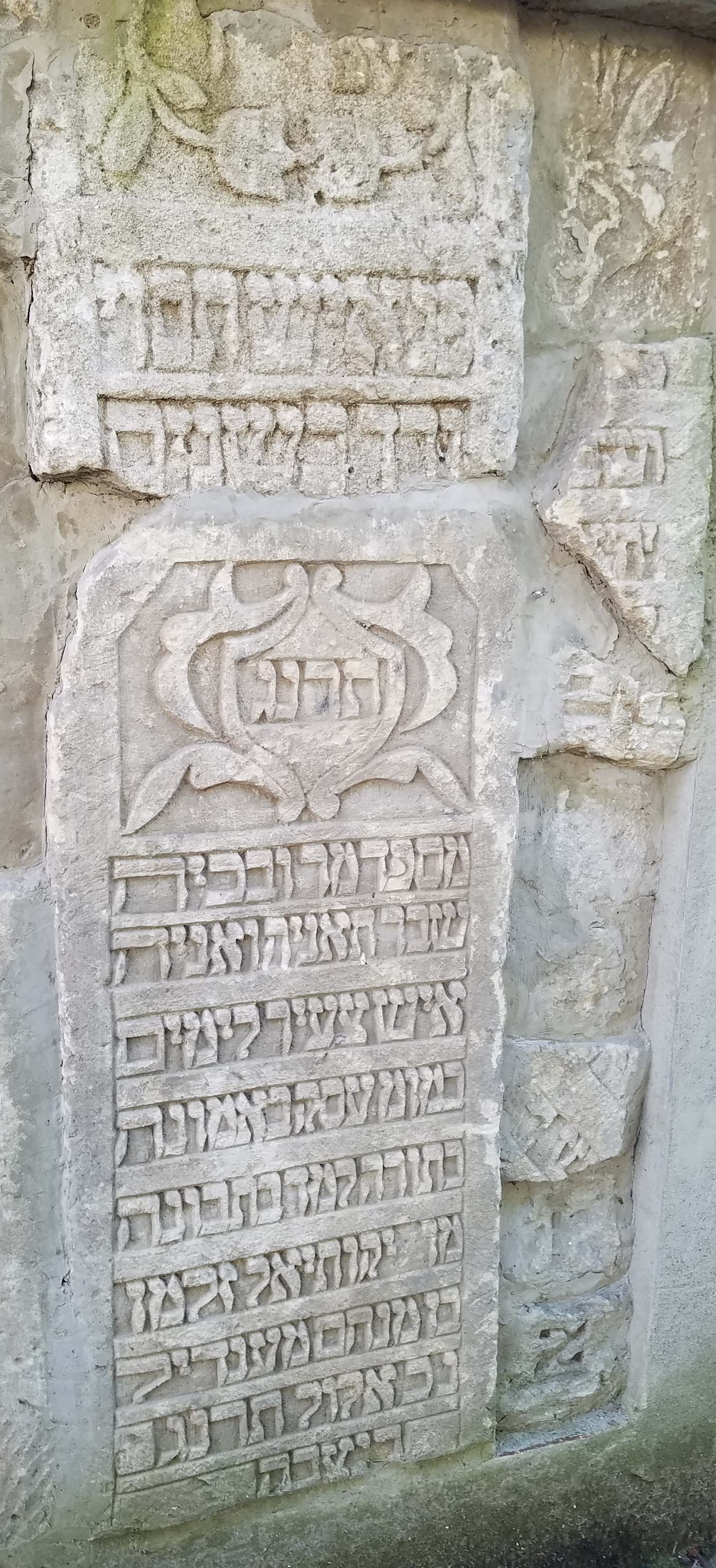 close up of
                  headstones on wall
