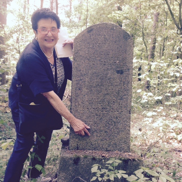 Barbara at the
                                gravestone of her grandmother Beila