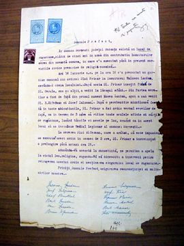 Typed petition to the prefect with revenue stamps and the signatures of the Dornești community members