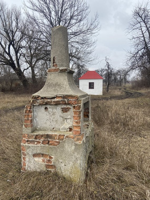 Old Cemetery monument with the Savran Hasidic ohel visible in the background
