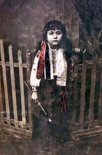 Raizel (Rose) Lechtzer, Stavisht, circa 1917. Raizel is about 7 years old in this photo, wearing her school uniform.