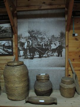 Basketry and a photo of a wedding celebration at the Folk Museum in Motol