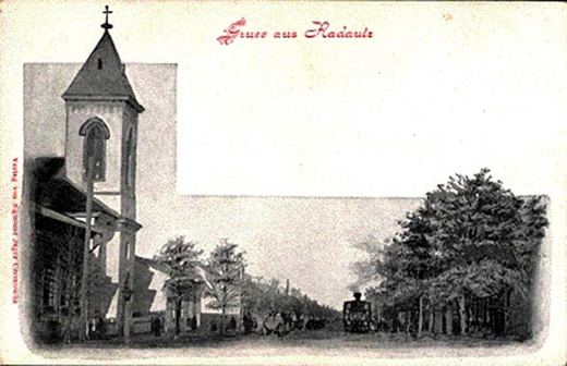 Postcard of a church and a tree-lined street