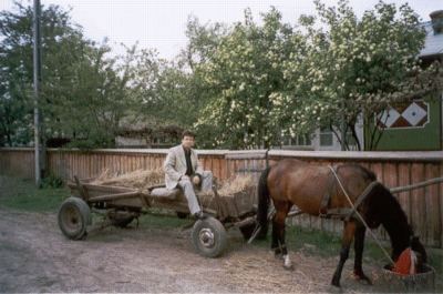 Marc Goldberger demonstrating farm transportation in Bukovina