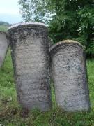 Two carved headstones, Arbore