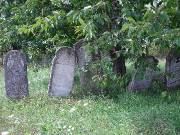 Headstones under fruit trees, Arbore