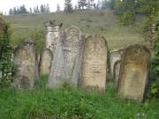 Old carved headstones on a hillside, Gura Humorului