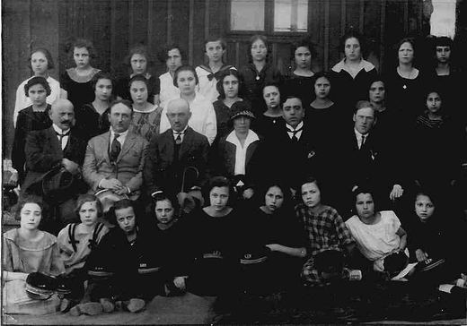 Group photograph of young people with adults, possibly a school class
